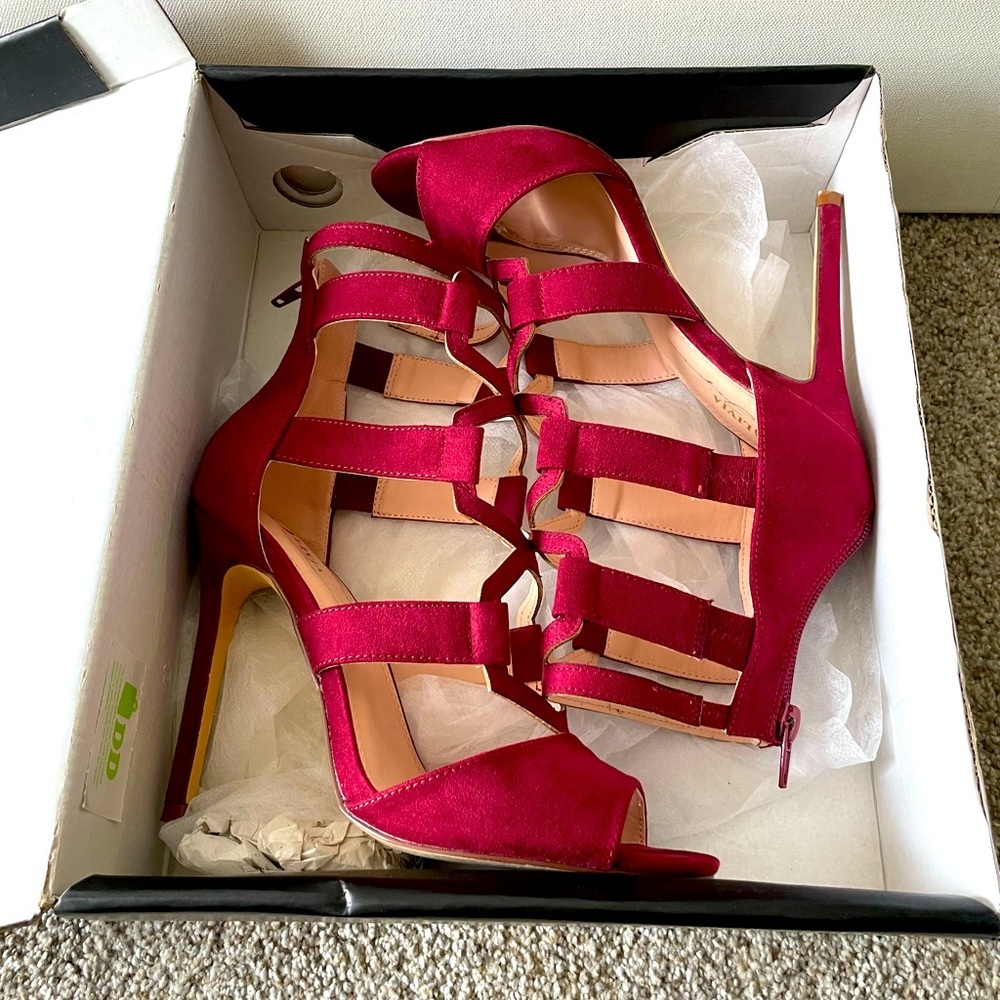 Wine suede 4 1/2 inch heels in good condition. Only wore a few times.
